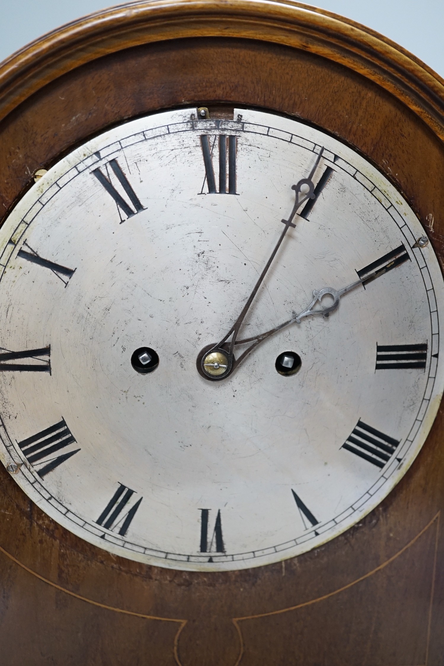 A late 19th/early 20th century mahogany mantel clock with German striking movement and convex silvered dial. 38cm tall